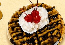 Waffle with whipped cream and cherries at Los Caporales in Odessa, TX